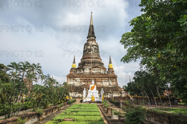 Buddha statues in front of the stupa at Wat Yai Chai Mongkhon