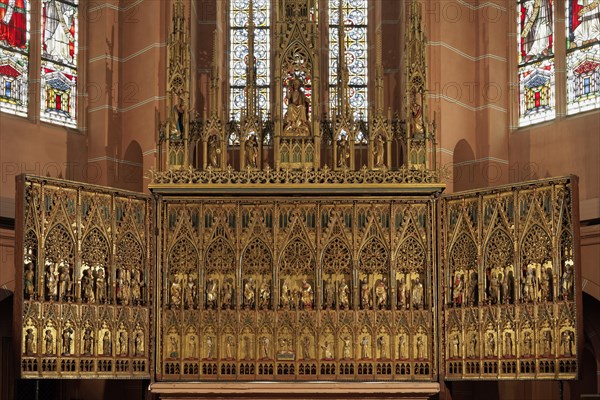 Gothic winged altar with wood carvings and figures