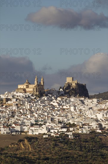 The hilltop White Town of Olvera with La Encarnacion church and the Moorish castle