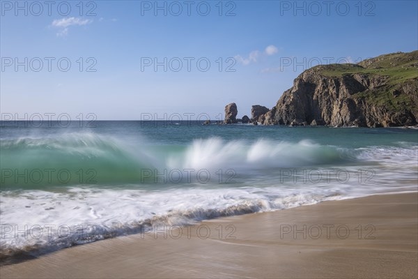Waves break on the beach of Dalmore