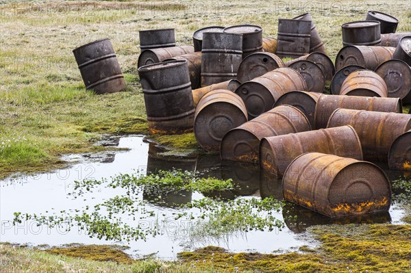 Rusty drums in the tundra