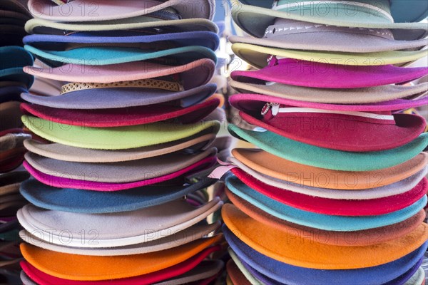 Stacks of colourful felt hats