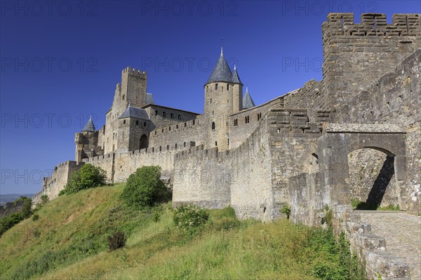 Towers and entrance gate Port d'Aude of the medieval fortress of Carcassonne