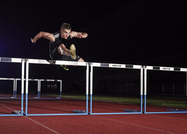 Hurdle racing athlete