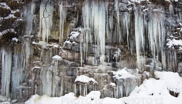 Icicles on rock wall