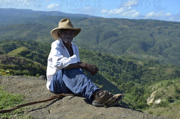 Old man with shoes with holes