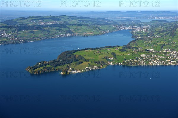 View from Mt Burgenstock of the Hertenstein peninsula in Lake Lucerne with the town of Weggis