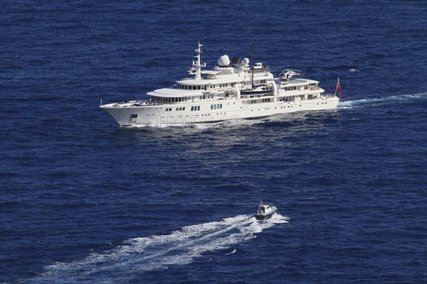 Nobiskrug motor yacht Tatoosh with pilot boat on the Cote d'Azur