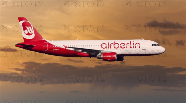 Air Berlin Airbus A320-214 in flight at night