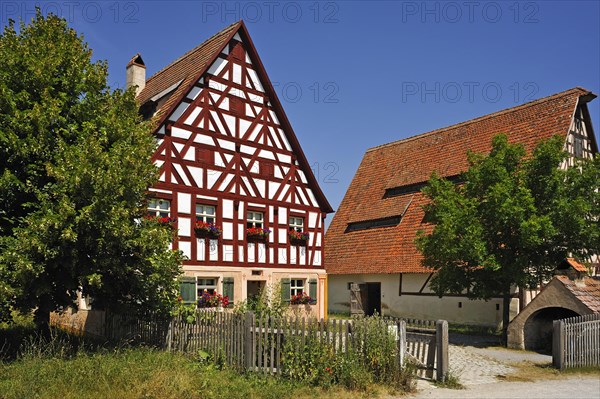 Half-timbered farmhouse on stone base