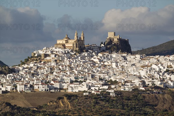 The hilltop White Town of Olvera with La Encarnacion church and the Moorish castle