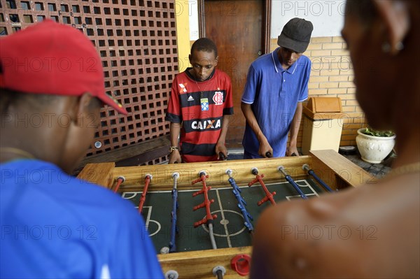 Boys playing table football