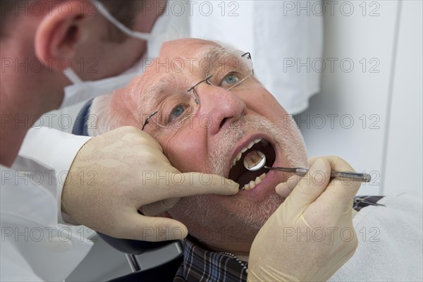 Senior man at the dentist