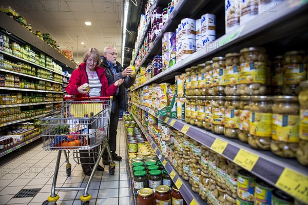 Senior couple shopping in a supermarket