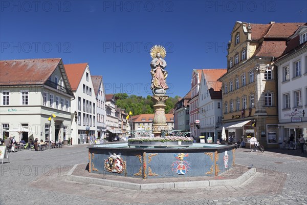 Madonna with a crescent moon on the Marienbrunnen fountain on Marktplatz square