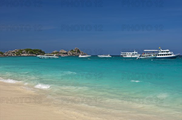 Excursion boats moored off the Similan Islands