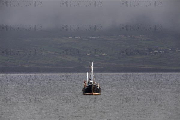 Fishing boat off the coast