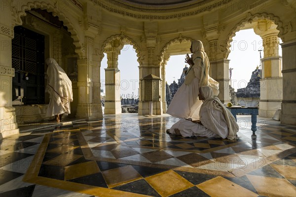 Jain nuns praying in a temple