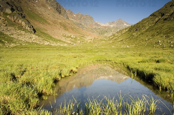 Mountain range reflected in Tumpen