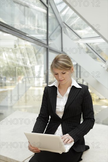 Business woman with a laptop