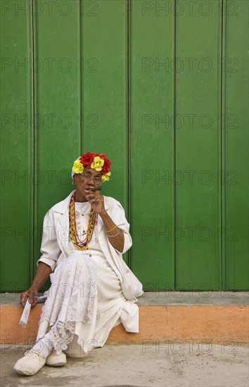 Local woman posing with a cigar