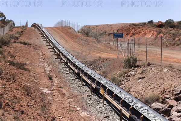 Conveyer band transporting rocks at a goldfield