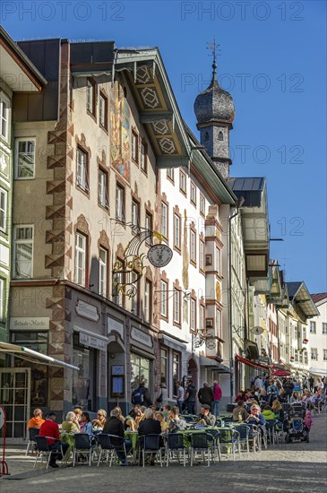 Row of houses and street cafes at the Marktstrasse street