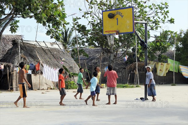 Children play basketball in a Kuna Indian village