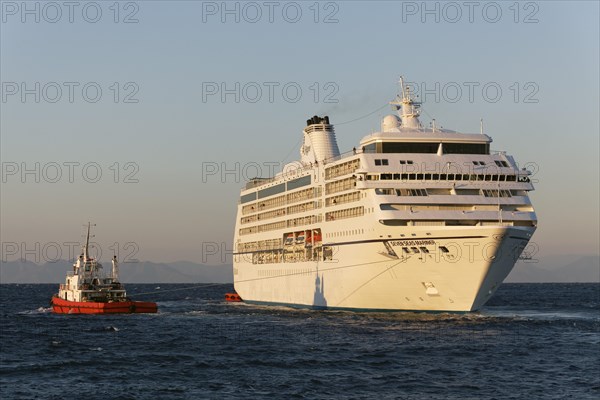 Seven Seas Mariner' cruise ship of Regent Seven Seas Cruises is towed out to sea