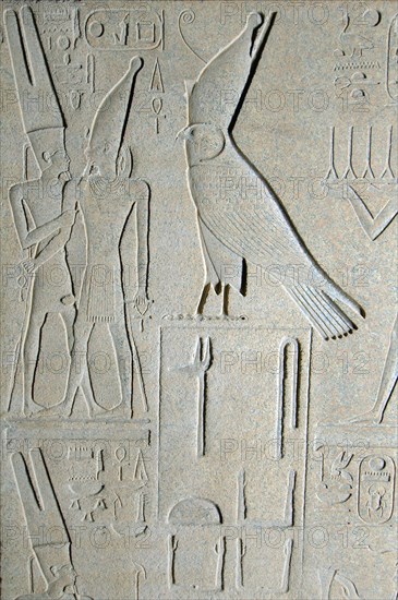Egyptian hieroglyphics on a granite obelisk