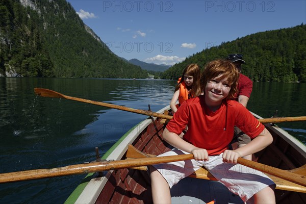 Children in a rowing boat on lake Konigssee