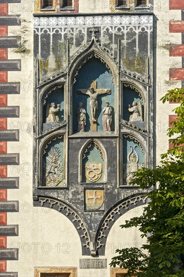 Gothic crucifixion group and donors' coats of arms of Duke William