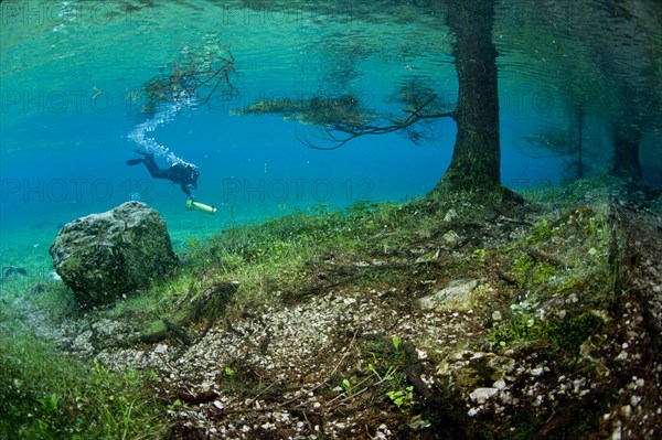 Scuba diver with a scooter