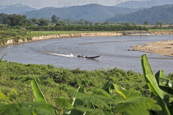 Longtail boat on the Maenam Kok River