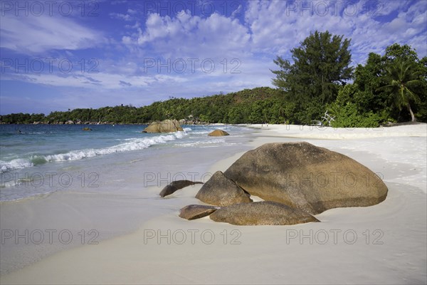 Sandy beach with the typical rock formations of the Seychelles