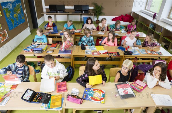 Children sitting in an elementary school class during a lesson