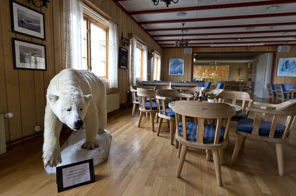 Stuffed Polar Bear inside the Var frelsers kirke pa Spitsbergen or Church of Our Savior on Svalbard