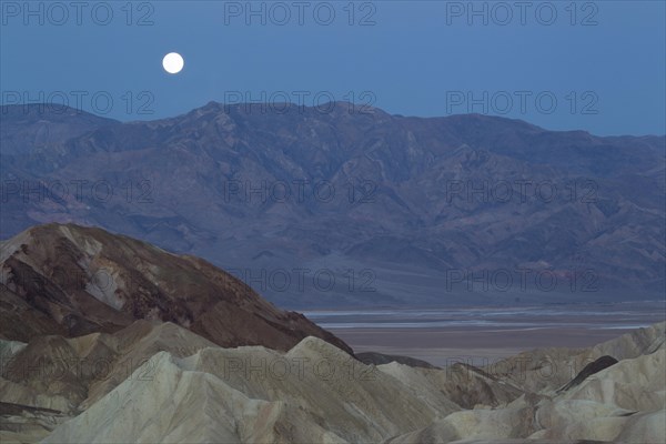 Full moon over the Panamint Range and the Death Valley at dawn