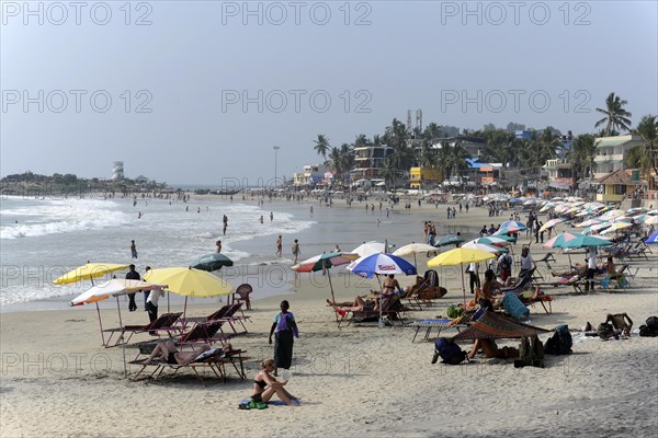 Tourists on the beach of Kovalam