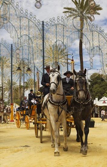 Decorated horses and dressed up coachmen at the Feria del Caballo Horse Fair