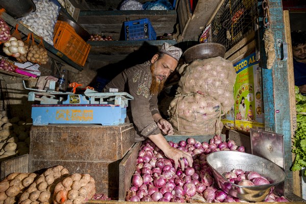 Man selling potatoes and onions at Crawfort Market