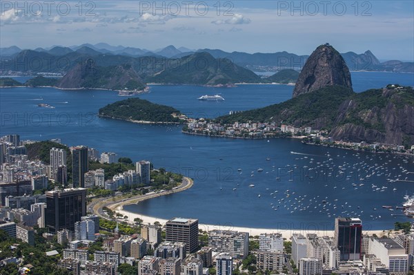 Outlook from the Christ the Redeemer statue over Rio de Janeiro and the Sugar Loaf