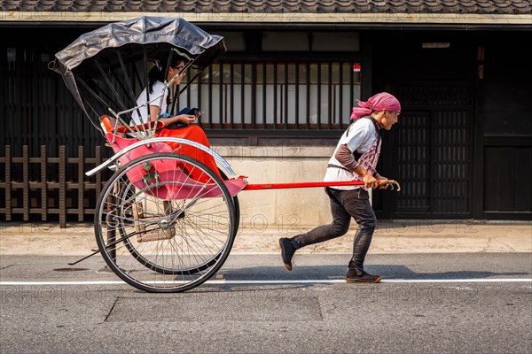 Rickshaw with a passenger