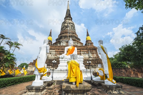 Buddha statues in front of the stupa at Wat Yai Chai Mongkhon