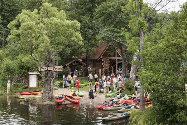 Tourists at a boat rental place at the Krutynia River