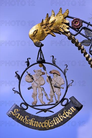Hanging sign of the restaurant 'Landsknechtstubchen'