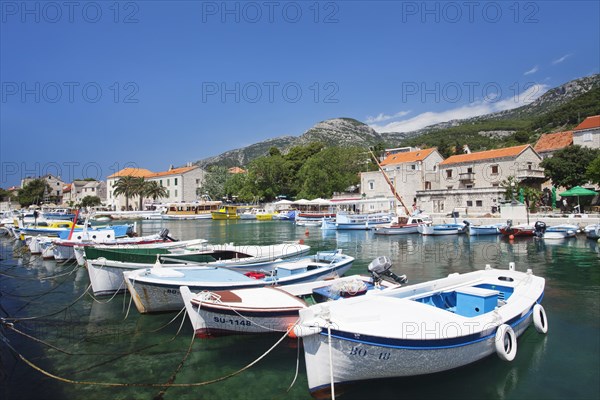 Boats in the harbour of Bol