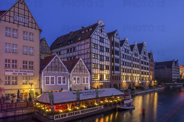 View of historic houses and a restaurant seen from Stagiewna bridge