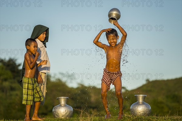 Boy washing himself