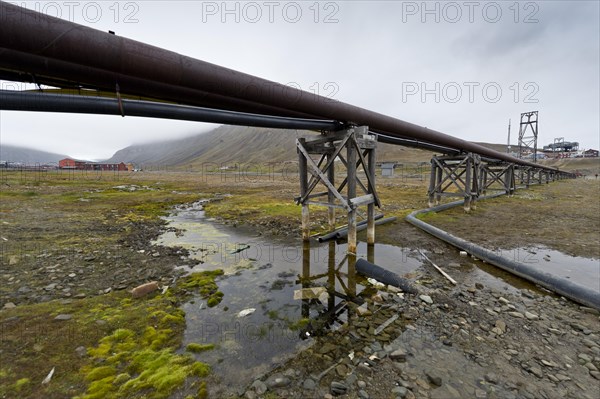 Utility pipes and supply lines installed above ground because of the permafrost